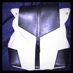 Mini white backpack with faux leather details
